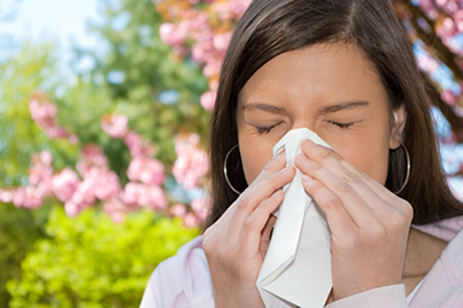 Woman experiencing spring allergies